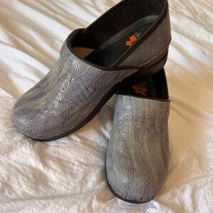 Dansko purple snakeskin clogs